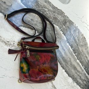 Patricia Nash floral leather bag. Never used. 11”tall, 8” wide, adjustable strap